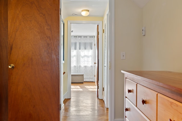 hall with light wood-type flooring