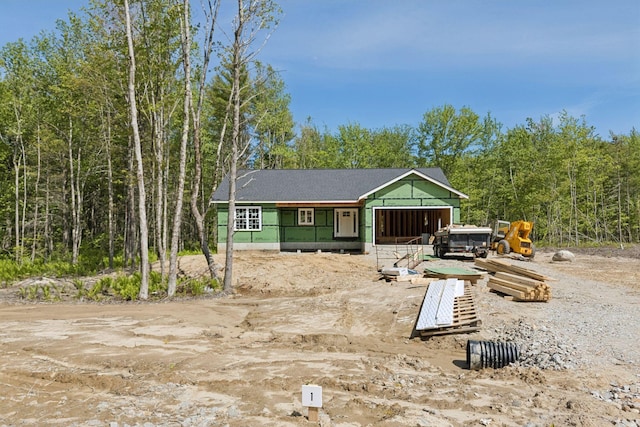 39 Jasper Ln, Arundel, ME 04046 - rear view of property featuring a forest view
