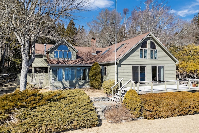 44 Periwinkle Ln, Phippsburg, ME 04562 - back of house featuring a wooden deck and a chimney