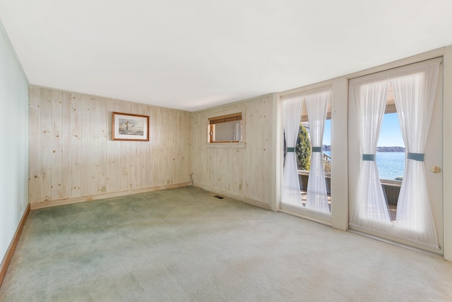 44 Periwinkle Ln, Phippsburg, ME 04562 - carpeted empty room featuring visible vents and baseboards