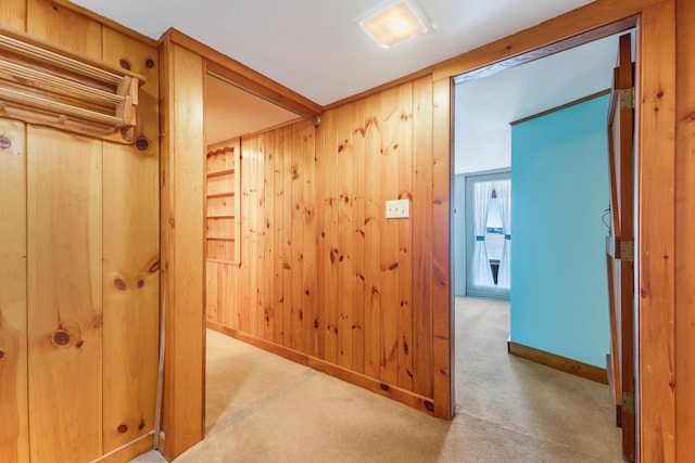 44 Periwinkle Ln, Phippsburg, ME 04562 - corridor featuring baseboards, wood walls, and carpet floors