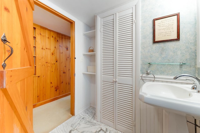 44 Periwinkle Ln, Phippsburg, ME 04562 - bathroom featuring marble finish floor, baseboards, and a sink