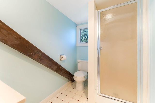 44 Periwinkle Ln, Phippsburg, ME 04562 - full bathroom with a shower stall, toilet, baseboards, and tile patterned floors