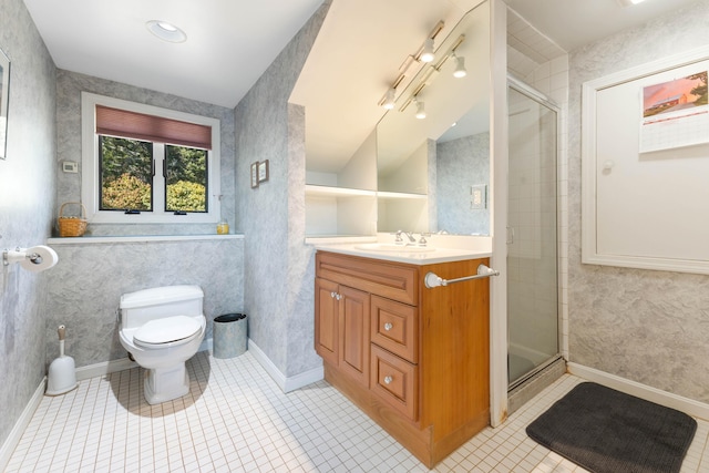 44 Periwinkle Ln, Phippsburg, ME 04562 - bathroom featuring a stall shower, toilet, vanity, and baseboards
