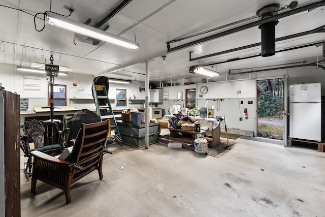 44 Periwinkle Ln, Phippsburg, ME 04562 - garage featuring freestanding refrigerator