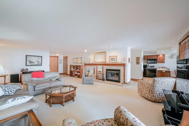 living area featuring a fireplace and light carpet