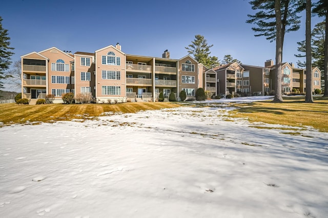 view of snow covered property