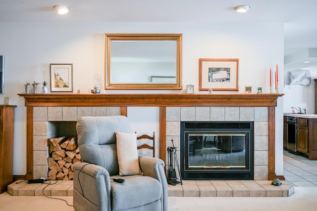 tiled living area with a tiled fireplace