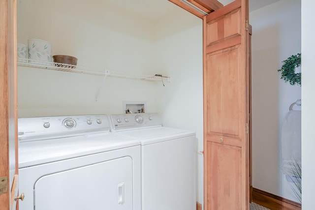 clothes washing area featuring laundry area and independent washer and dryer