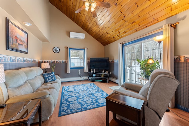 living area with a baseboard heating unit, wooden ceiling, wood finished floors, and a wall mounted air conditioner