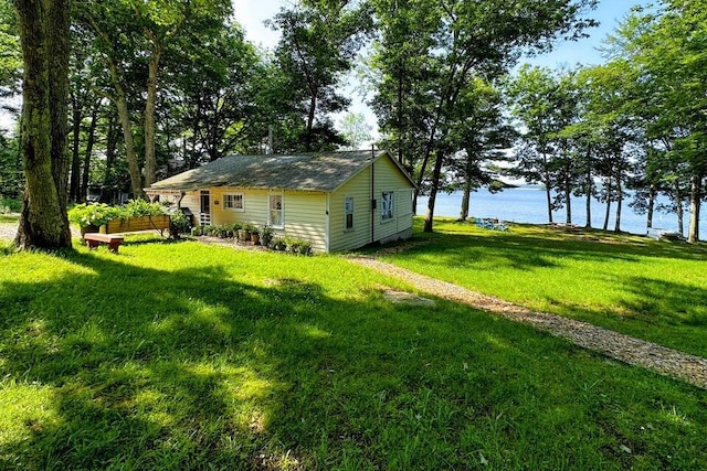 view of yard with a water view