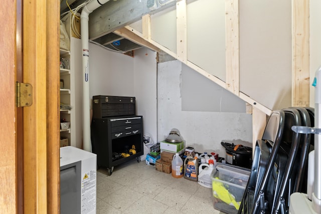 basement with tile patterned floors