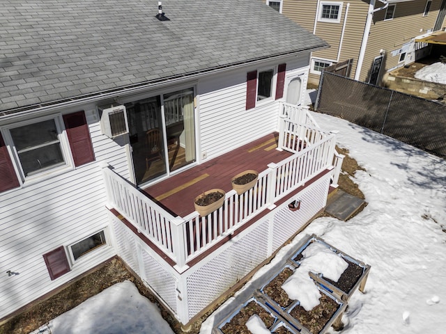 wooden deck featuring fence