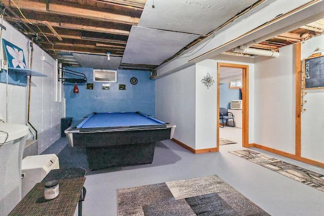 recreation room with baseboards, pool table, and finished concrete floors