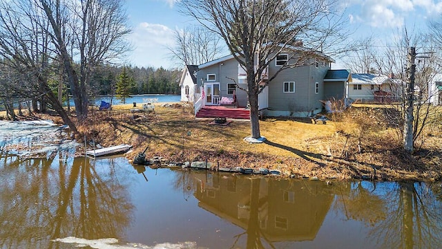 exterior space with a water view