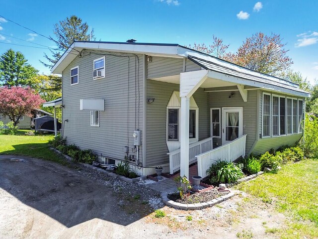 12 Town Line Rd, Belgrade, ME 04917 - view of property exterior featuring cooling unit