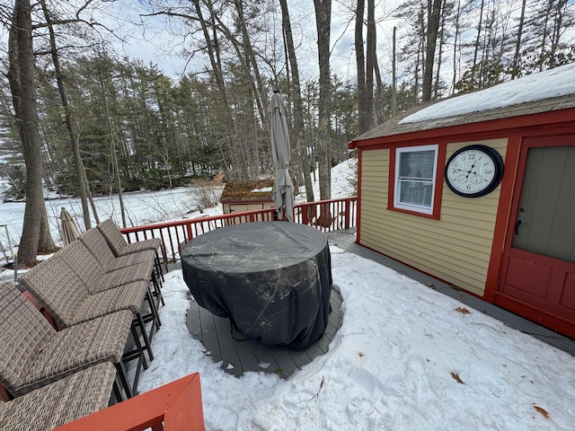 view of snow covered deck