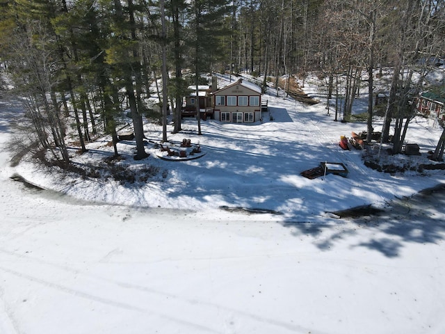 view of yard layered in snow