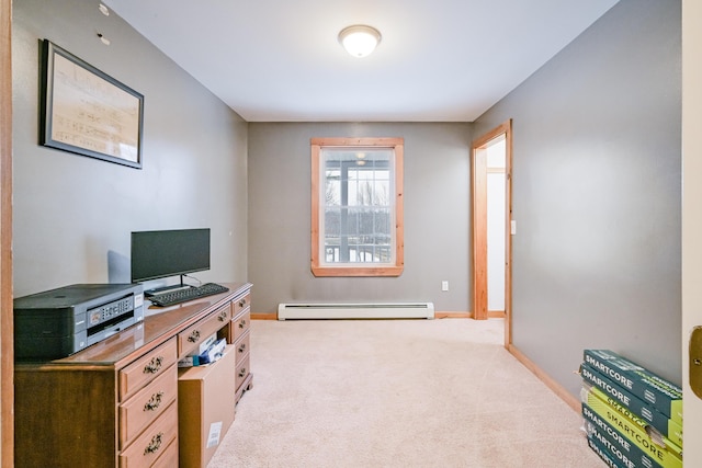 carpeted home office with a baseboard radiator and baseboards