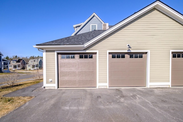 garage with driveway