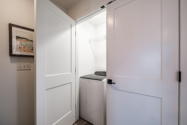 washroom with laundry area and washer / clothes dryer