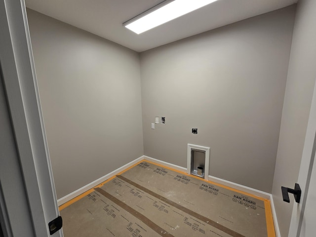 washroom featuring hookup for an electric dryer, washer hookup, laundry area, and baseboards