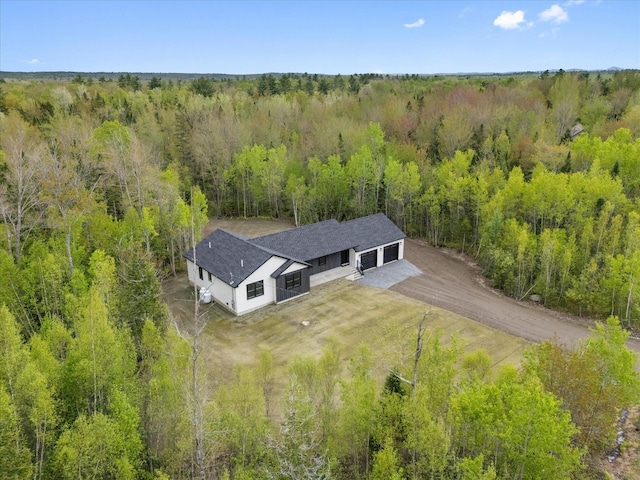 67 Stacey Ln, Kenduskeag, ME 04450 - aerial view of property and surrounding area with a heavily wooded area