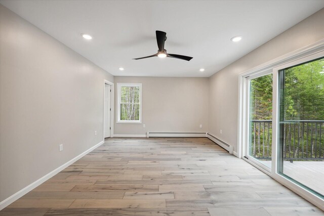 67 Stacey Ln, Kenduskeag, ME 04450 - unfurnished room with ceiling fan, light wood-style floors, recessed lighting, baseboards, and a baseboard radiator