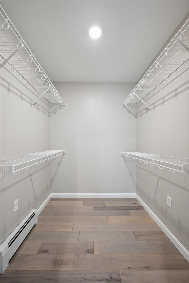 67 Stacey Ln, Kenduskeag, ME 04450 - spacious closet with baseboard heating and wood finished floors