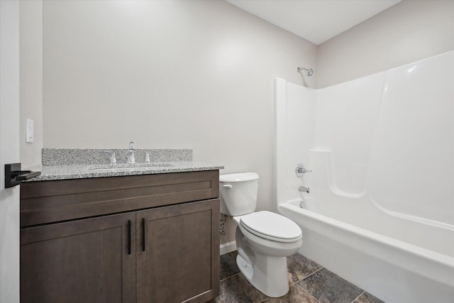 67 Stacey Ln, Kenduskeag, ME 04450 - bathroom with vanity, toilet, tub / shower combination, and baseboards