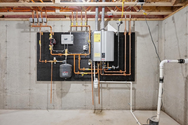 67 Stacey Ln, Kenduskeag, ME 04450 - utility room featuring water heater