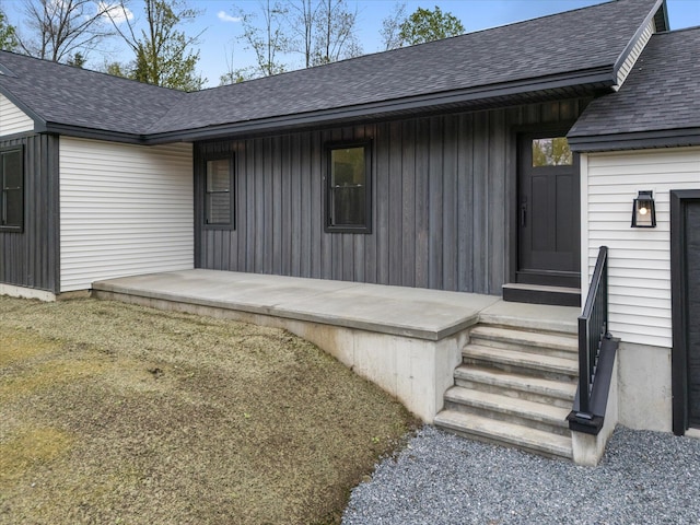 67 Stacey Ln, Kenduskeag, ME 04450 - view of exterior entry with roof with shingles