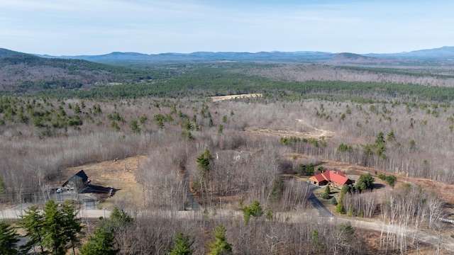 drone / aerial view with a mountain view and a rural view