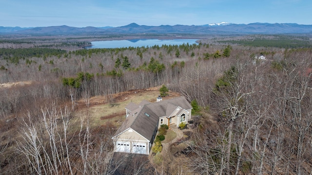 bird's eye view with a water and mountain view