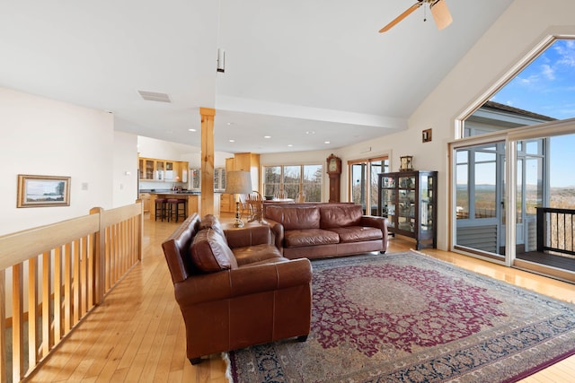 living room with light wood-style floors, ceiling fan, recessed lighting, and visible vents