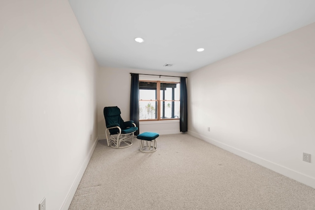 unfurnished room with baseboards, carpet flooring, visible vents, and recessed lighting