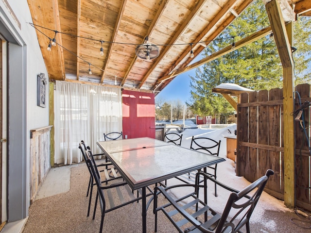 view of patio / terrace with outdoor dining space and fence