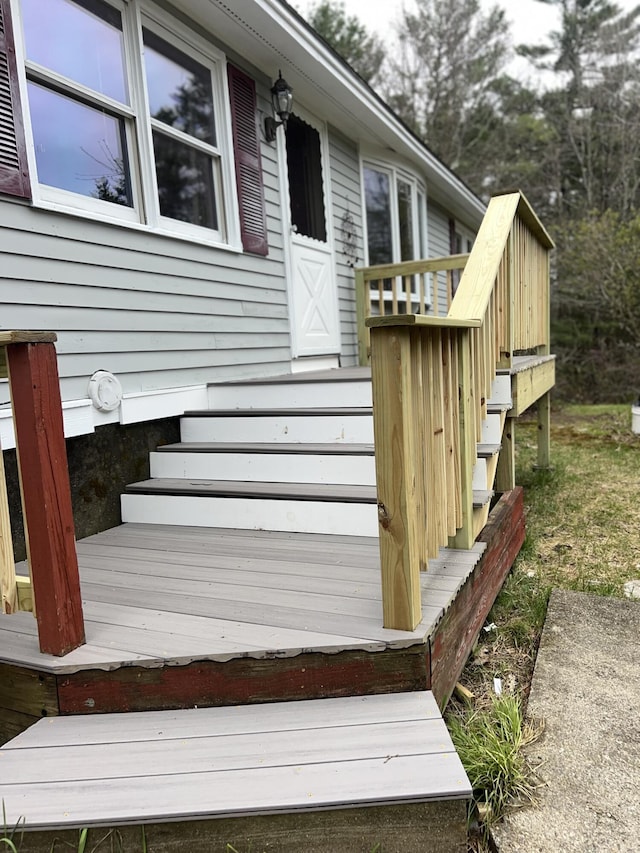 doorway to property with a wooden deck