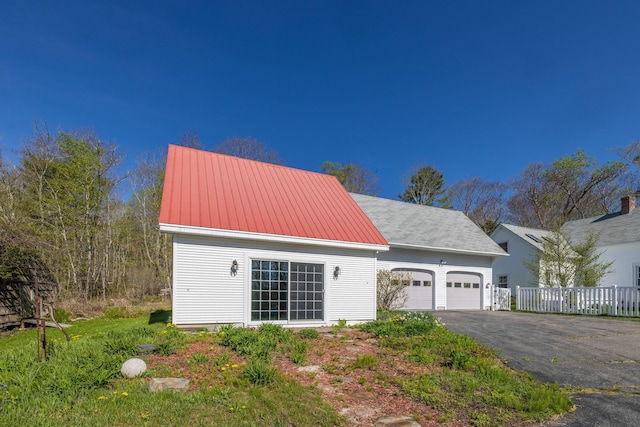 550 Belfast Rd, Camden, ME 04843 - garage with fence and driveway