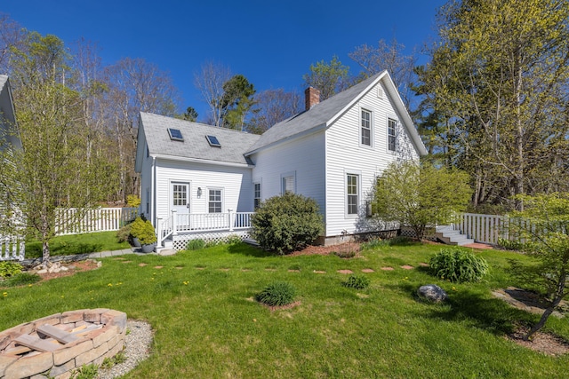 550 Belfast Rd, Camden, ME 04843 - back of property featuring a chimney and a shingled roof