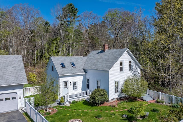 550 Belfast Rd, Camden, ME 04843 - view of front of property with a chimney, a garage, and a shingled roof