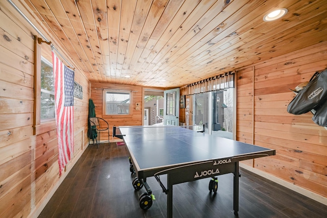 84 Ira Mountain Rd, Kingfield, ME 04947 - recreation room with wooden ceiling, wooden walls, dark wood-type flooring, and baseboards