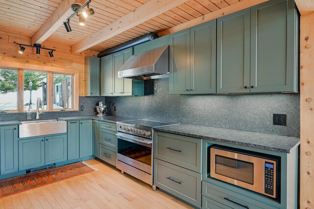 84 Ira Mountain Rd, Kingfield, ME 04947 - kitchen with wall chimney exhaust hood, a sink, appliances with stainless steel finishes, wooden ceiling with exposed beams, and light wood finished floors