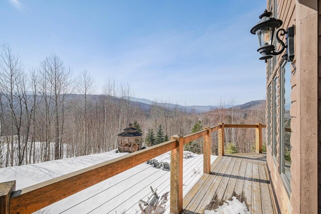 84 Ira Mountain Rd, Kingfield, ME 04947 - snow covered deck with a mountain view