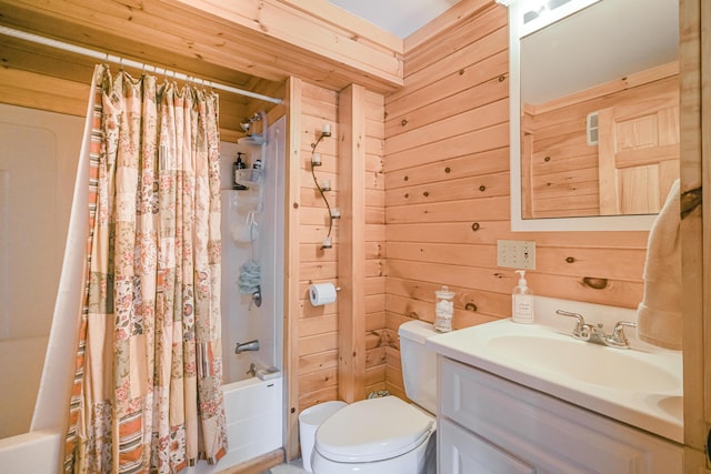 84 Ira Mountain Rd, Kingfield, ME 04947 - full bathroom with vanity, shower / bath combo with shower curtain, toilet, and wood walls