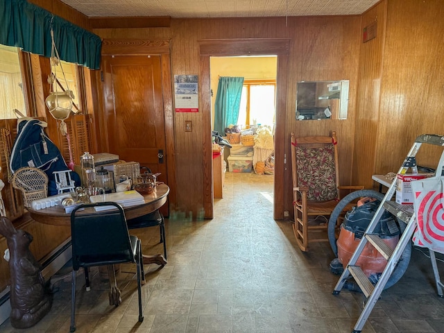 home office featuring wood walls