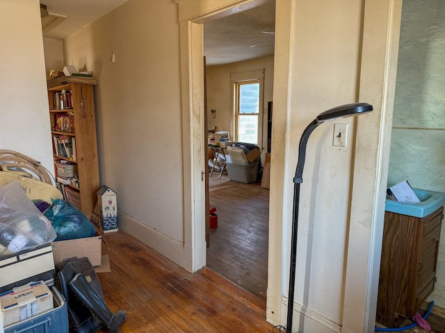 bedroom featuring baseboards and hardwood / wood-style floors