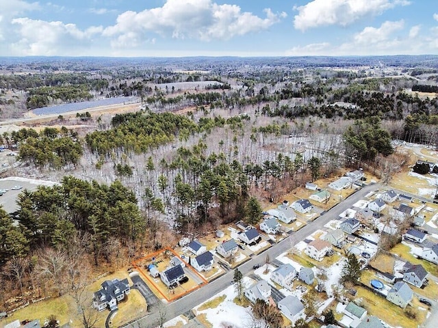 birds eye view of property with a residential view