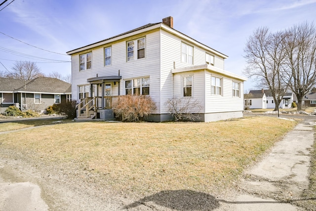 view of front of property with a front yard, central air condition unit, and a chimney