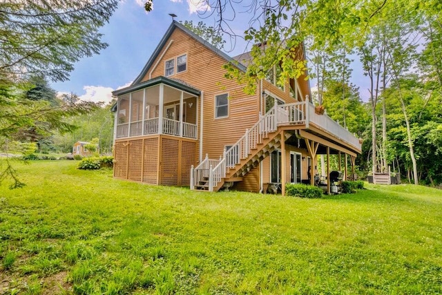 19 Glenview Ln, Belfast, ME 04915 - rear view of property featuring stairway, a lawn, and a wooden deck